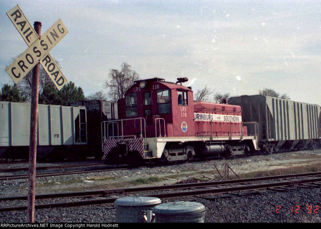 LRS 116 shuffles some cars in the yard